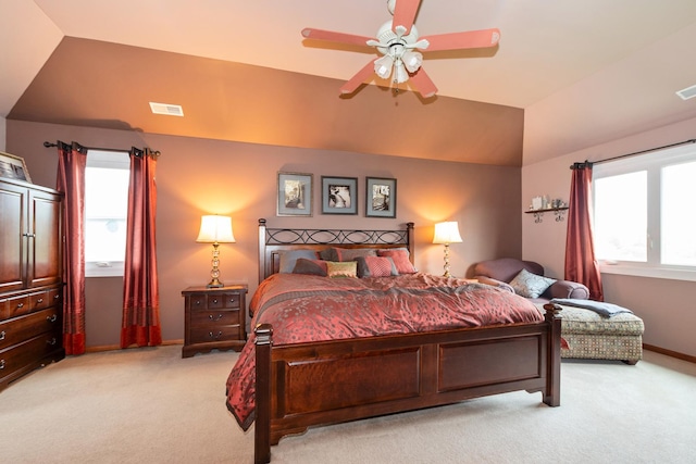 8147 Nielsen Dr, Tinley Park, IL 60477 - bedroom with light colored carpet, vaulted ceiling, multiple windows, and a ceiling fan