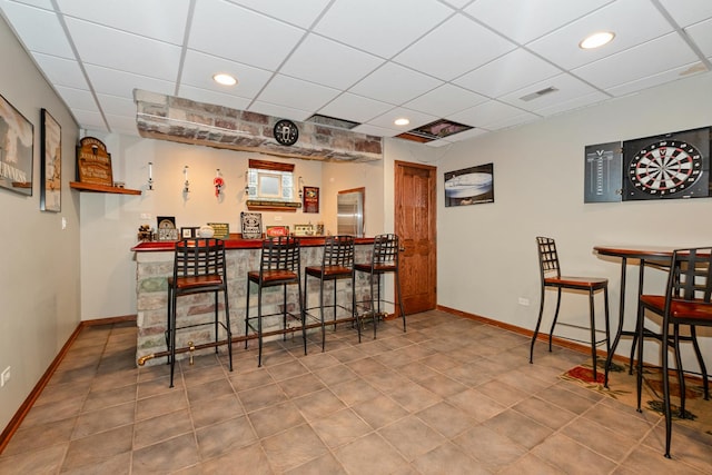 8147 Nielsen Dr, Tinley Park, IL 60477 - indoor dry bar featuring a drop ceiling, recessed lighting, tile patterned flooring, and high end refrigerator
