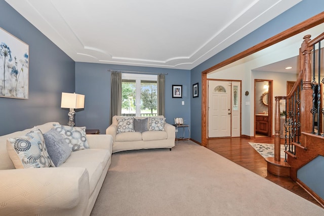 8147 Nielsen Dr, Tinley Park, IL 60477 - living room with stairway, a tray ceiling, and wood finished floors