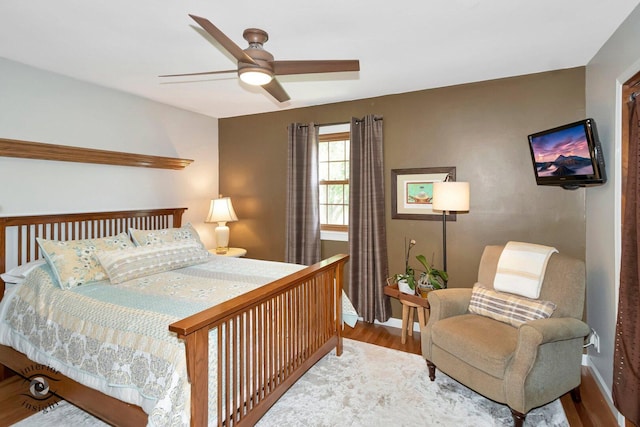 623 Woodstock Ln, Bourbonnais, IL 60914 - bedroom with wood finished floors, baseboards, and ceiling fan