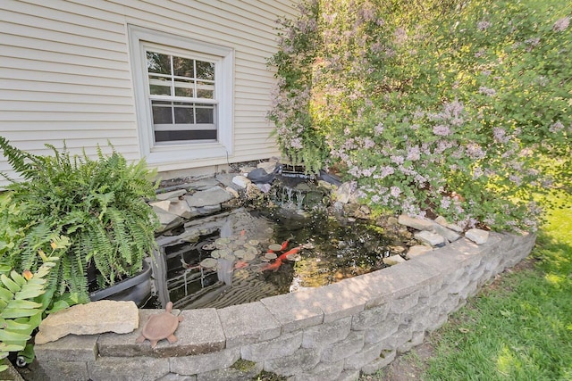 623 Woodstock Ln, Bourbonnais, IL 60914 - exterior view of a small pond