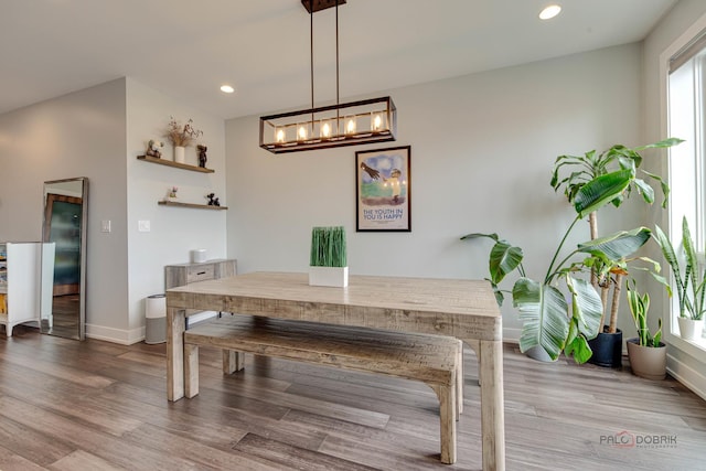 2860 N Milwaukee Ave Unit 2S, Chicago, IL 60618 - dining area featuring baseboards, wood finished floors, recessed lighting, and a chandelier