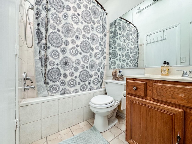 1703 S Ruble St, Chicago, IL 60616 - full bathroom with toilet, tiled shower / bath, vanity, and tile patterned floors