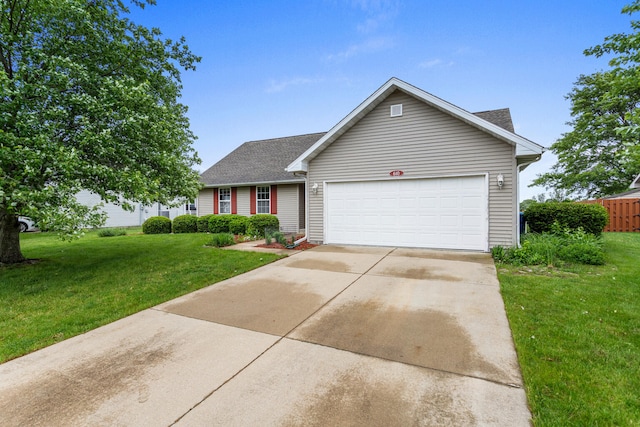 610 Chestnut Dr, Saint Joseph, IL 61873 - view of front of property with an attached garage, a front lawn, driveway, and roof with shingles