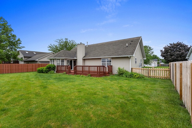 610 Chestnut Dr, Saint Joseph, IL 61873 - rear view of property featuring a chimney, a deck, and roof with shingles