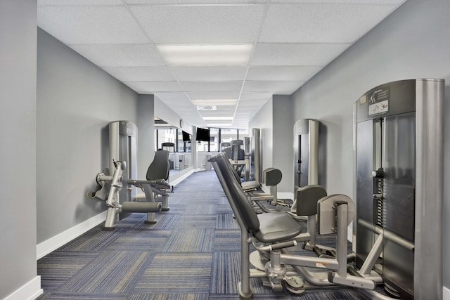 405 N Wabash Ave Unit 1002, Chicago, IL 60611 - gym with baseboards, a paneled ceiling, and dark carpet