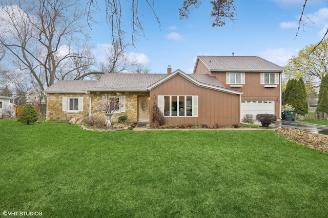 view of front of home featuring driveway, stone siding, a chimney, an attached garage, and roof with shingles