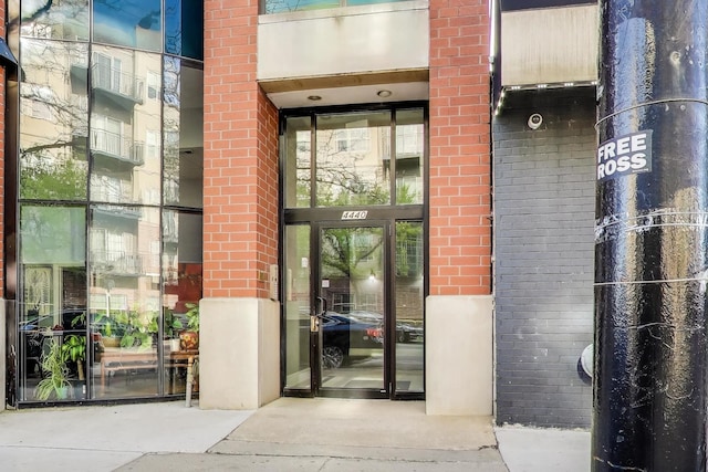 4440 N Kedzie Ave Unit 401, Chicago, IL 60625 - doorway to property featuring brick siding
