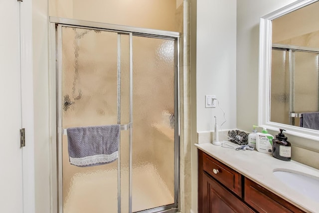 4440 N Kedzie Ave Unit 401, Chicago, IL 60625 - bathroom featuring a stall shower and vanity