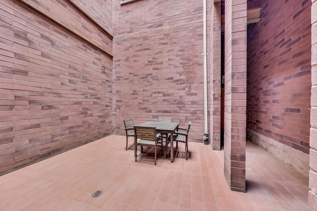 4440 N Kedzie Ave Unit 401, Chicago, IL 60625 - view of patio / terrace featuring outdoor dining area