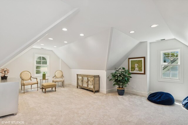 550 Rosemary Rd, Lake Forest, IL 60045 - living area with lofted ceiling, light colored carpet, plenty of natural light, recessed lighting, and baseboards