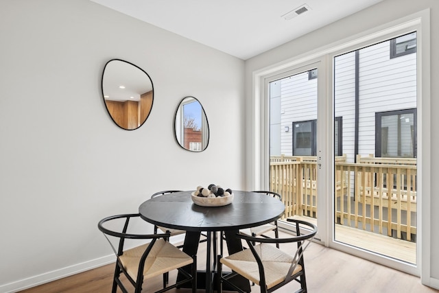 944 Beloit Ave Unit 2, Forest Park, IL 60130 - dining area featuring wood finished floors and baseboards