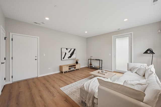 944 Beloit Ave Unit 2, Forest Park, IL 60130 - living area featuring light wood-style flooring, baseboards, and recessed lighting