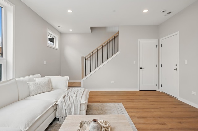 944 Beloit Ave Unit 2, Forest Park, IL 60130 - living area with light wood-style flooring, recessed lighting, stairs, and baseboards
