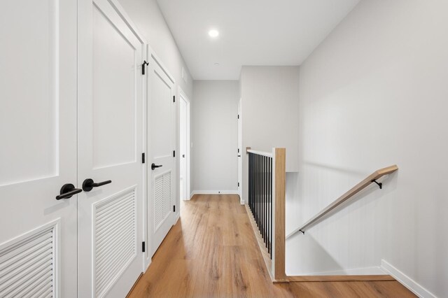 944 Beloit Ave Unit 2, Forest Park, IL 60130 - living room featuring stairway, light wood-style flooring, recessed lighting, and baseboards