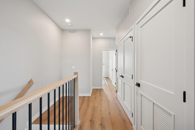 944 Beloit Ave Unit 2, Forest Park, IL 60130 - hall featuring light wood-style flooring, recessed lighting, an upstairs landing, and baseboards