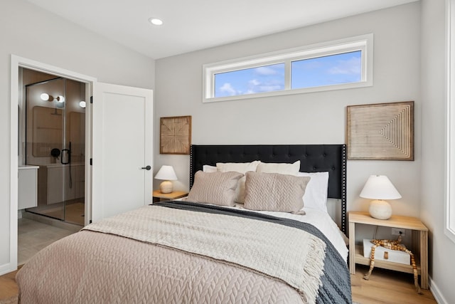 944 Beloit Ave Unit 2, Forest Park, IL 60130 - bedroom with recessed lighting, wood finished floors, and ensuite bath