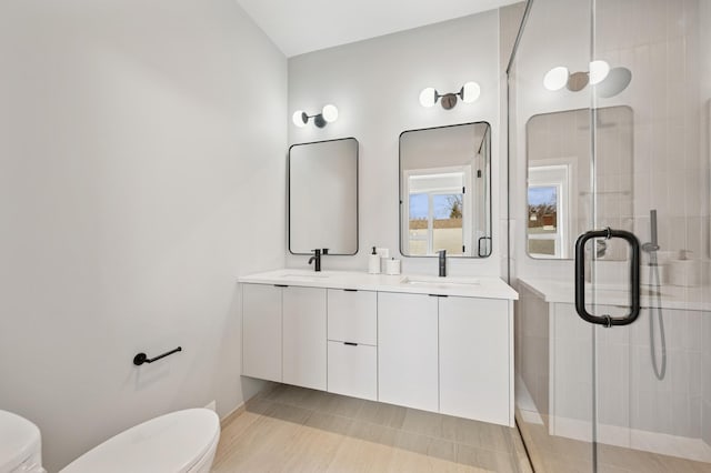 944 Beloit Ave Unit 2, Forest Park, IL 60130 - full bath with toilet, a shower stall, and double vanity