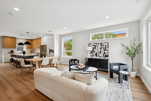 944 Beloit Ave Unit 2, Forest Park, IL 60130 - living room with recessed lighting, light wood-type flooring, and baseboards