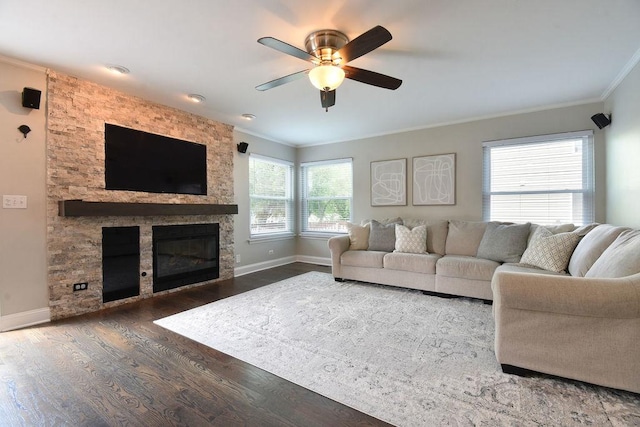 1112 Laurel Ln, Gurnee, IL 60031 - living area featuring ornamental molding, wood finished floors, ceiling fan, baseboards, and a fireplace