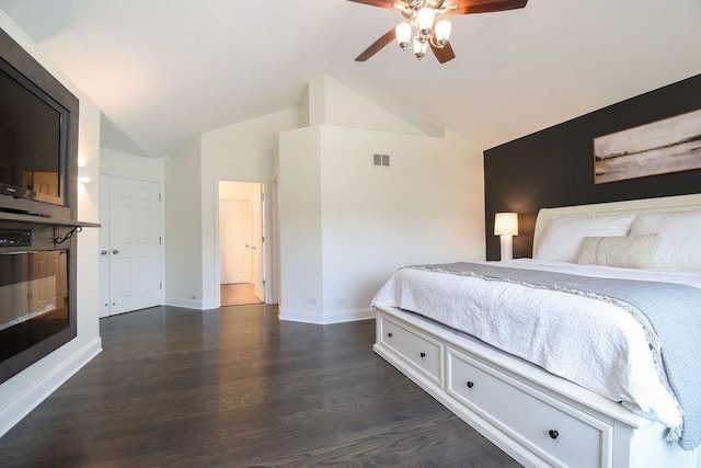 1112 Laurel Ln, Gurnee, IL 60031 - bedroom with dark wood finished floors, baseboards, high vaulted ceiling, and ceiling fan
