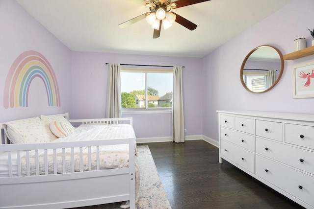 1112 Laurel Ln, Gurnee, IL 60031 - bedroom with baseboards, dark wood-style flooring, and ceiling fan