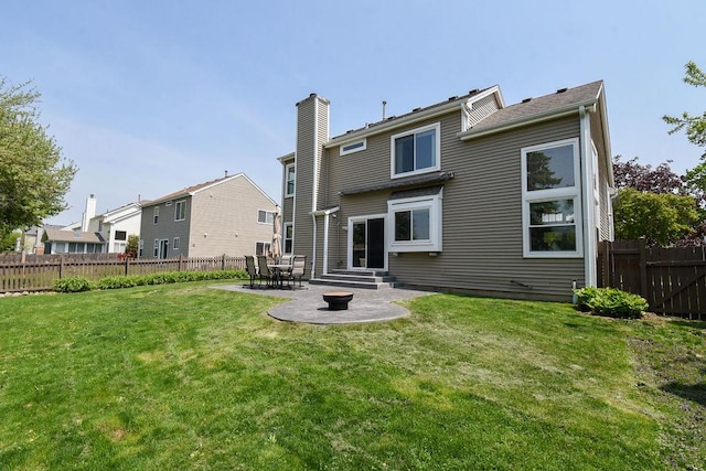 1112 Laurel Ln, Gurnee, IL 60031 - back of property featuring a patio area, entry steps, and a chimney
