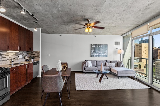 living area with dark wood-style floors, a ceiling fan, and track lighting