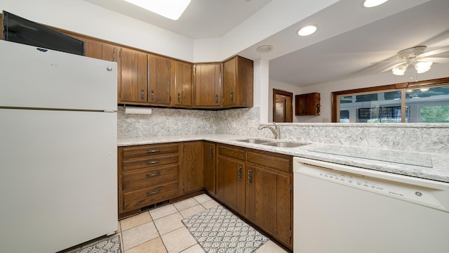 321 E Chamberlin St, Dixon, IL 61021 - kitchen with white appliances, a sink, light countertops, tasteful backsplash, and a ceiling fan