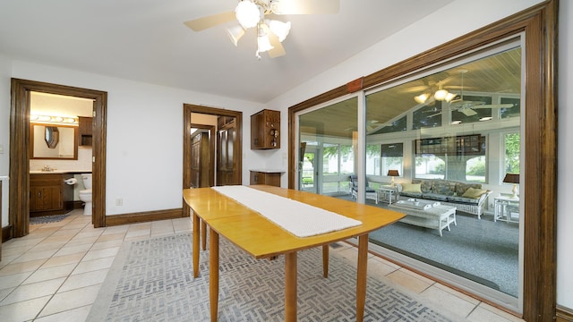321 E Chamberlin St, Dixon, IL 61021 - dining area with ceiling fan, light tile patterned flooring, and baseboards