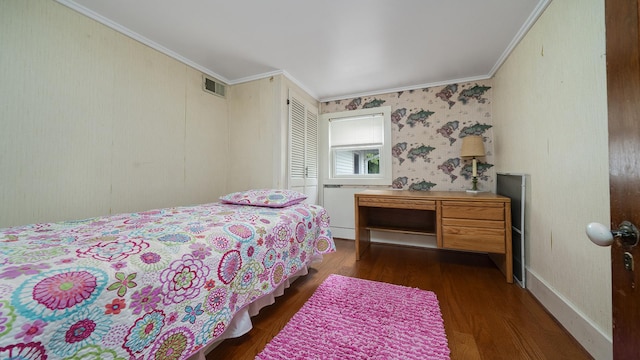 321 E Chamberlin St, Dixon, IL 61021 - bedroom featuring ornamental molding and dark wood-style flooring