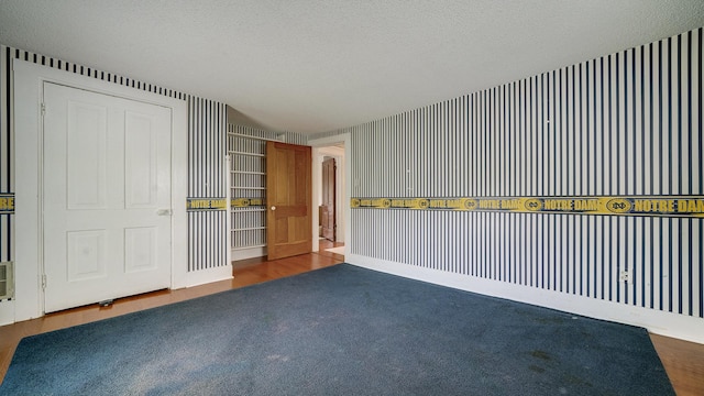 321 E Chamberlin St, Dixon, IL 61021 - spare room featuring a textured ceiling