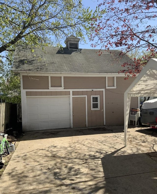 523 Edwards St, Aurora, IL 60505 - view of front of home with concrete driveway, a garage, and roof with shingles