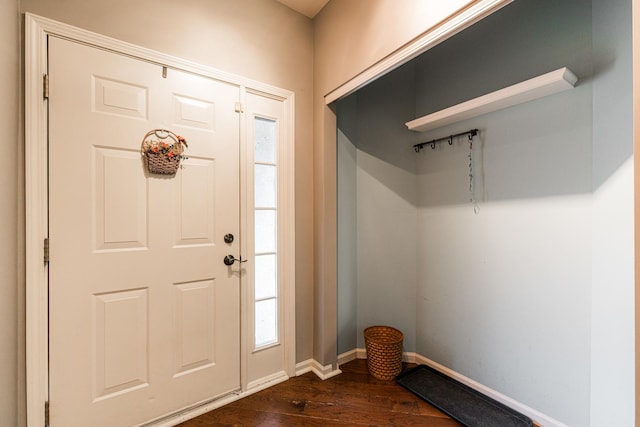 722 Amherst Dr, Sycamore, IL 60178 - foyer entrance with dark wood-style flooring and baseboards