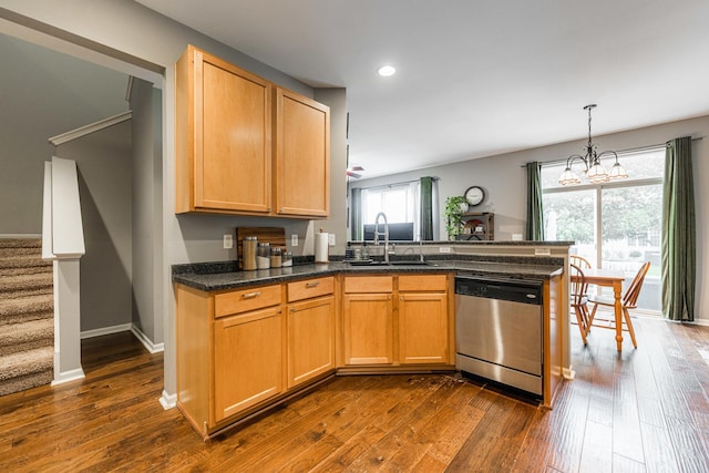 722 Amherst Dr, Sycamore, IL 60178 - kitchen featuring dishwasher, a sink, a peninsula, recessed lighting, and dark wood-style floors