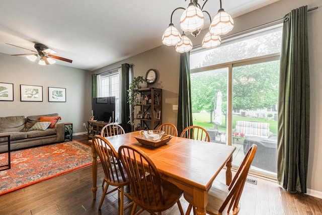 722 Amherst Dr, Sycamore, IL 60178 - dining room featuring hardwood / wood-style flooring, ceiling fan, a chandelier, and baseboards
