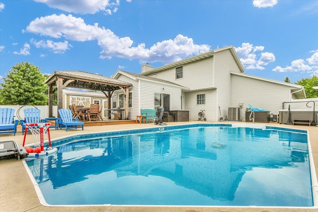 705 Northridge Dr, Mahomet, IL 61853 - view of swimming pool with a gazebo and a deck