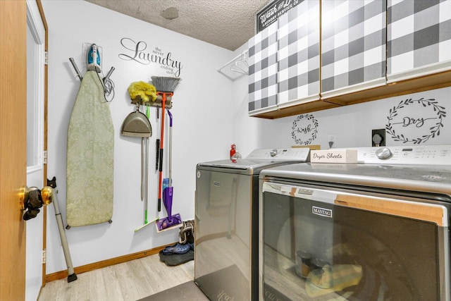 705 Northridge Dr, Mahomet, IL 61853 - washroom featuring washing machine and dryer, wood finished floors, and a textured ceiling