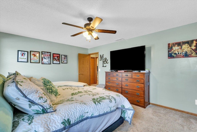 705 Northridge Dr, Mahomet, IL 61853 - bedroom with carpet flooring, a ceiling fan, and a textured ceiling