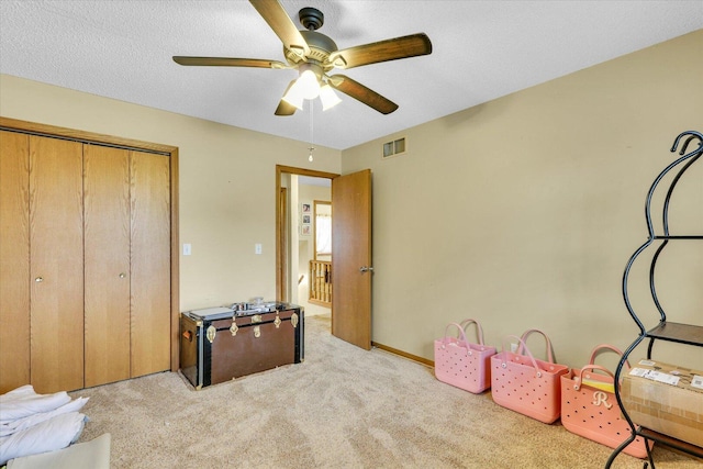 705 Northridge Dr, Mahomet, IL 61853 - bedroom featuring carpet floors, a closet, and ceiling fan