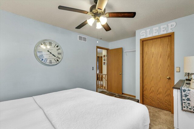 705 Northridge Dr, Mahomet, IL 61853 - carpeted bedroom with ceiling fan and a closet