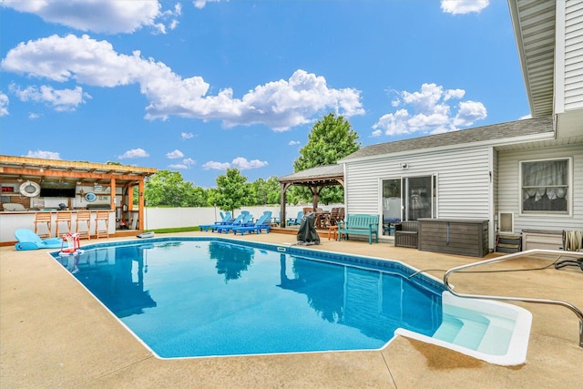705 Northridge Dr, Mahomet, IL 61853 - view of pool featuring a patio area, an outdoor kitchen, and an outdoor hangout area