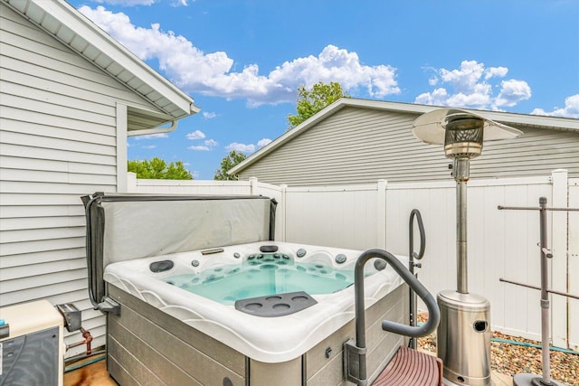 705 Northridge Dr, Mahomet, IL 61853 - view of patio featuring a hot tub