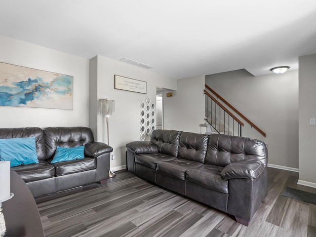 1094 Rainwood Dr, Aurora, IL 60506 - living room featuring wood finished floors, baseboards, and stairs