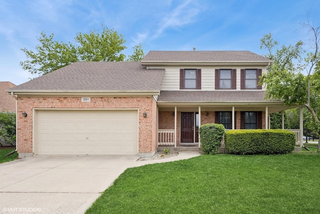 201 Rosewood Ct, Westmont, IL 60559 - traditional-style home with concrete driveway, a front yard, brick siding, and an attached garage