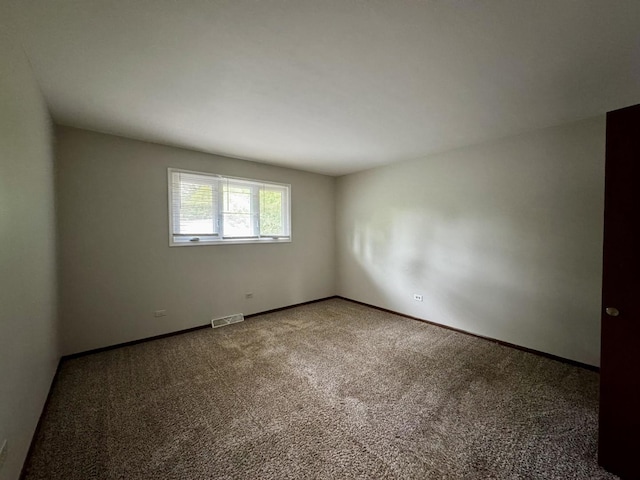16104 Oak Ave, Oak Forest, IL 60452 - spare room with carpet floors and baseboards