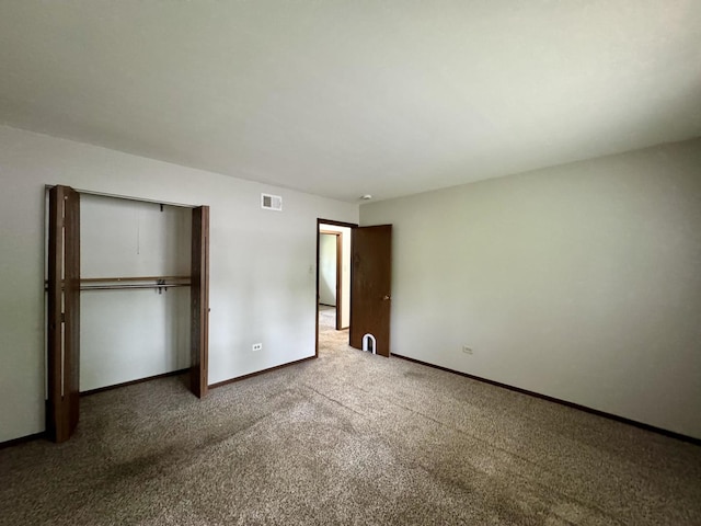 16104 Oak Ave, Oak Forest, IL 60452 - unfurnished bedroom featuring carpet flooring, a closet, and baseboards