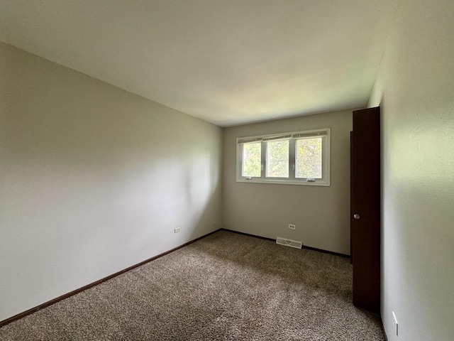 16104 Oak Ave, Oak Forest, IL 60452 - empty room featuring carpet floors and baseboards