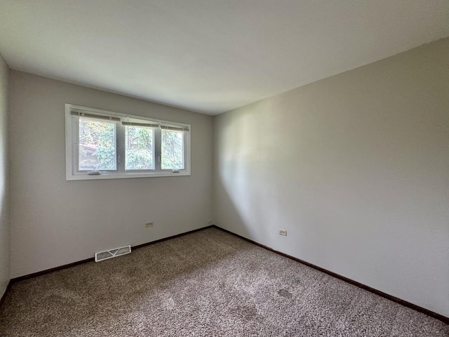 16104 Oak Ave, Oak Forest, IL 60452 - spare room with carpet flooring and baseboards
