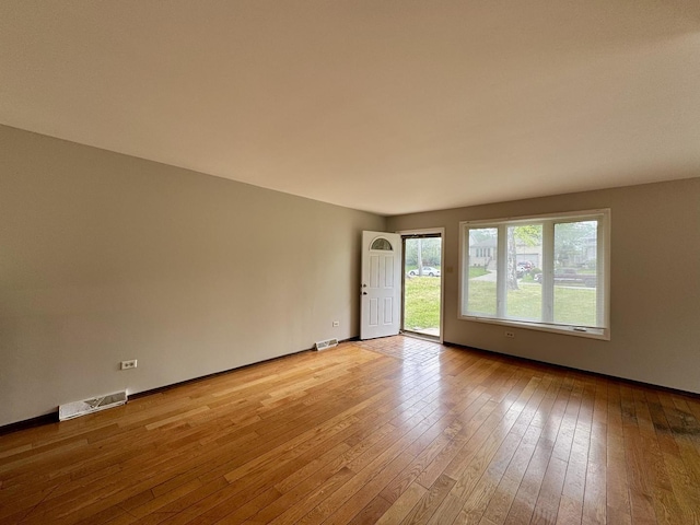 16104 Oak Ave, Oak Forest, IL 60452 - spare room featuring light wood finished floors and baseboards